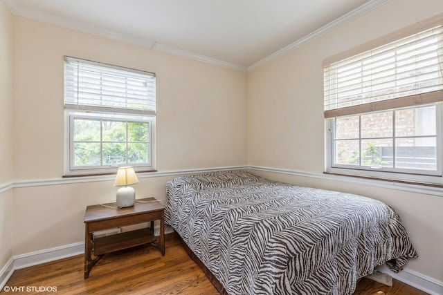 9445 Le Claire Ave, Skokie, IL 60077 - bedroom with multiple windows, crown molding, and wood finished floors
