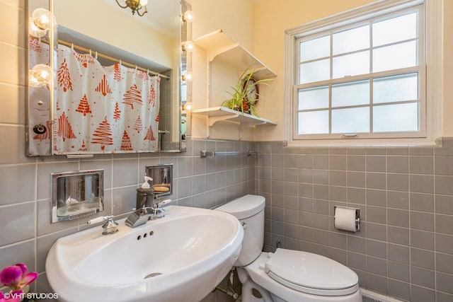 9445 Le Claire Ave, Skokie, IL 60077 - bathroom with tile walls and a shower with curtain