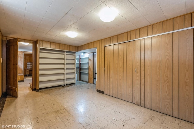 9445 Le Claire Ave, Skokie, IL 60077 - finished basement featuring wood walls and tile patterned floors