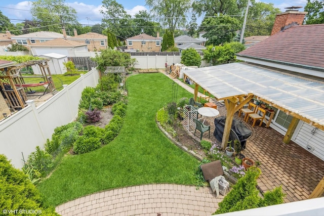 9445 Le Claire Ave, Skokie, IL 60077 - fenced backyard with a patio area and a residential view