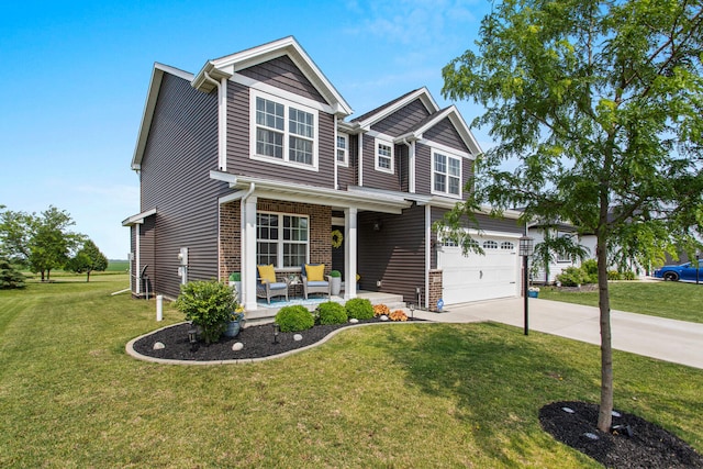 1607 Peppermill Ln, Champaign, IL 61822 - craftsman-style home featuring concrete driveway, a front yard, a porch, and an attached garage
