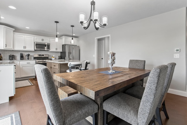 1607 Peppermill Ln, Champaign, IL 61822 - dining area featuring a chandelier, recessed lighting, and dark wood-style floors