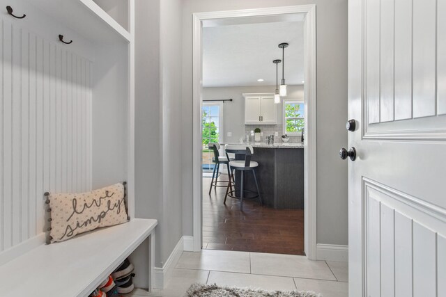1607 Peppermill Ln, Champaign, IL 61822 - mudroom with baseboards and light tile patterned floors