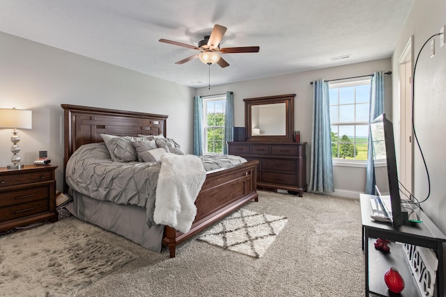 1607 Peppermill Ln, Champaign, IL 61822 - bedroom featuring carpet, multiple windows, and a ceiling fan