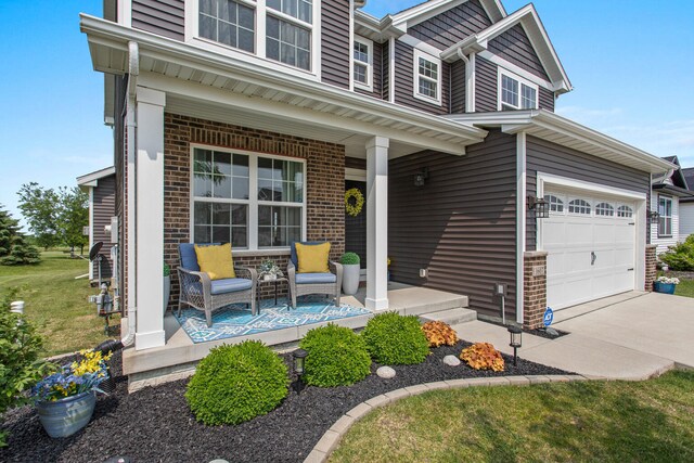 1607 Peppermill Ln, Champaign, IL 61822 - view of front facade featuring a porch, driveway, and brick siding