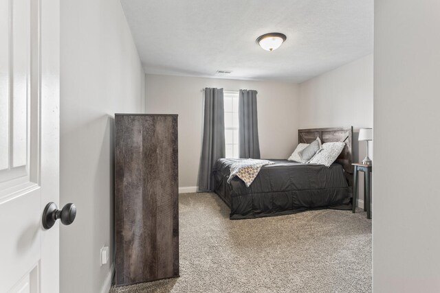 1607 Peppermill Ln, Champaign, IL 61822 - carpeted bedroom featuring baseboards