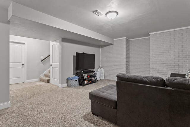 1607 Peppermill Ln, Champaign, IL 61822 - living area featuring carpet flooring, stairway, and brick wall