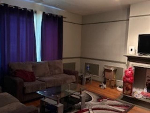 living area with wood finished floors