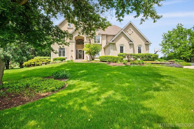 36W850 Red Gate Ct, Saint Charles, IL 60175 - view of front of property featuring stucco siding and a front lawn