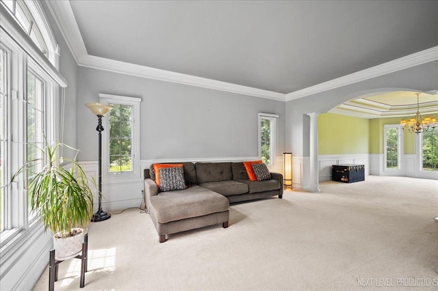 36W850 Red Gate Ct, Saint Charles, IL 60175 - living room with arched walkways, ornamental molding, a wainscoted wall, decorative columns, and a chandelier