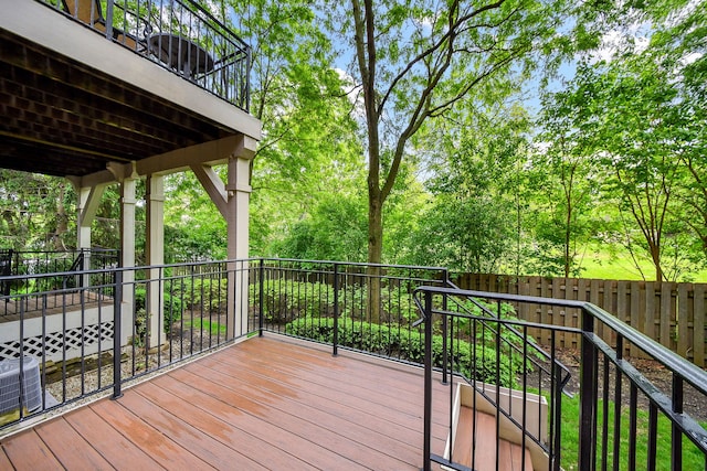 17 Virginia Pkwy, Schaumburg, IL 60193 - wooden terrace with central air condition unit and view of wooded area