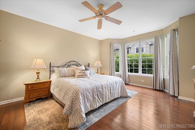 211 Trentt Dr Unit 211, Batavia, IL 60510 - bedroom featuring baseboards, hardwood / wood-style floors, and ceiling fan