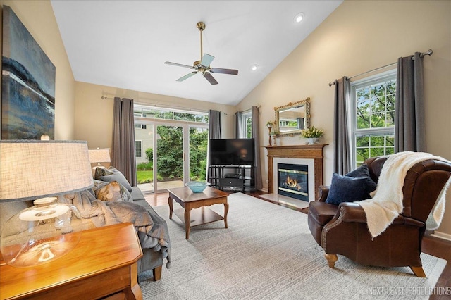 211 Trentt Dr Unit 211, Batavia, IL 60510 - living room featuring plenty of natural light, a glass covered fireplace, ceiling fan, wood finished floors, and recessed lighting