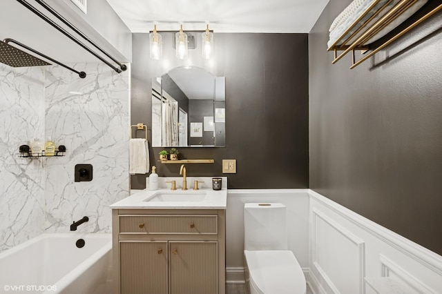 5854 N Kenmore Ave Unit 4F, Chicago, IL 60660 - full bathroom featuring shower / washtub combination, vanity, toilet, a decorative wall, and a wainscoted wall