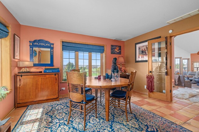 20719 Highview Rd, Marengo, IL 60152 - dining space with french doors and light tile patterned floors