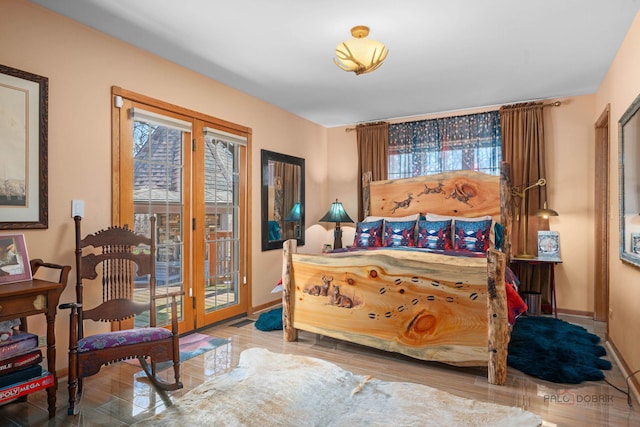20719 Highview Rd, Marengo, IL 60152 - bedroom with access to outside, french doors, and wood finished floors