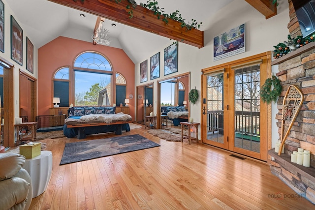 20719 Highview Rd, Marengo, IL 60152 - living room with hardwood / wood-style flooring, high vaulted ceiling, healthy amount of natural light, and beam ceiling