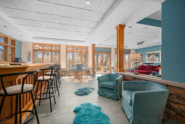 20719 Highview Rd, Marengo, IL 60152 - living room featuring decorative columns, french doors, and a drop ceiling