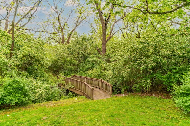 20719 Highview Rd, Marengo, IL 60152 - view of grassy yard with a wooden deck and a forest view