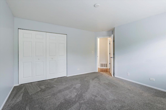 1300 Woodside Ct Unit B2, Schaumburg, IL 60193 - unfurnished bedroom with carpet floors, baseboards, and a closet