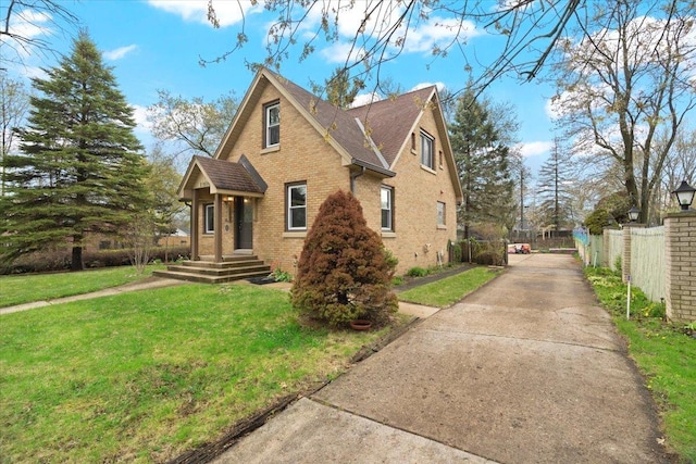 2906 Bethel Blvd, Zion, IL 60099 - view of front of house featuring brick siding, concrete driveway, and roof with shingles