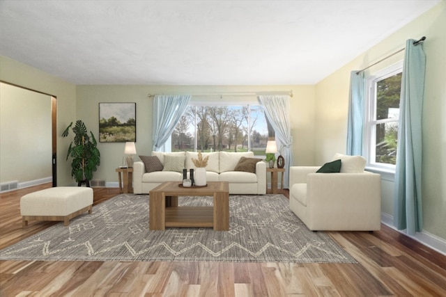 2906 Bethel Blvd, Zion, IL 60099 - living area featuring wood finished floors and baseboards