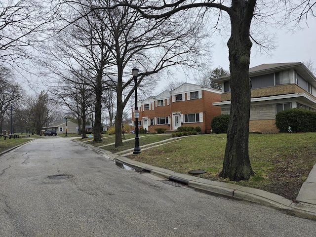 1737 Mcdaniel Ave Unit B, Evanston, IL 60201 - view of asphalt road with curbs, street lighting, and a residential view