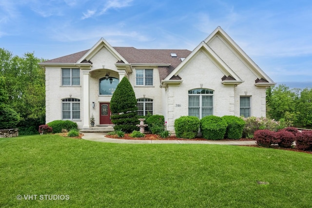 316 Juliana Ln, Bloomingdale, IL 60108 - view of front of property featuring a front yard and a shingled roof