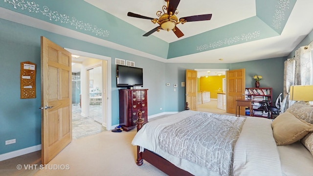 316 Juliana Ln, Bloomingdale, IL 60108 - bedroom featuring carpet flooring, baseboards, a ceiling fan, and a tray ceiling