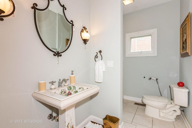 316 Juliana Ln, Bloomingdale, IL 60108 - bathroom with toilet, baseboards, and tile patterned flooring