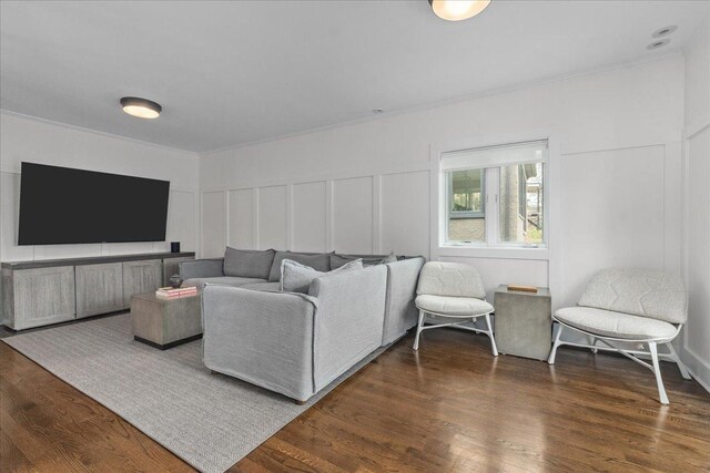 2087 W Greenleaf Ave, Chicago, IL 60645 - living area featuring ornamental molding, wood finished floors, and a decorative wall