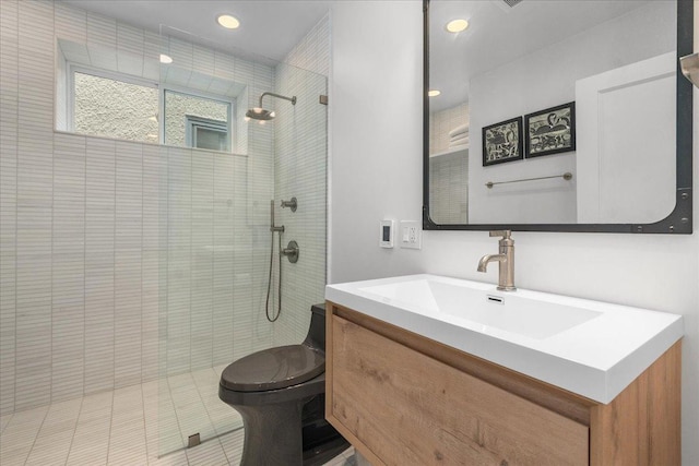 2087 W Greenleaf Ave, Chicago, IL 60645 - bathroom featuring vanity, toilet, walk in shower, and recessed lighting