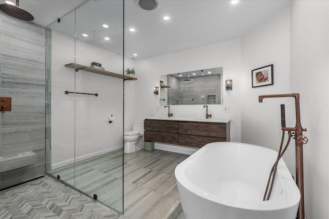 2087 W Greenleaf Ave, Chicago, IL 60645 - bathroom featuring tiled shower, a freestanding bath, double vanity, recessed lighting, and toilet
