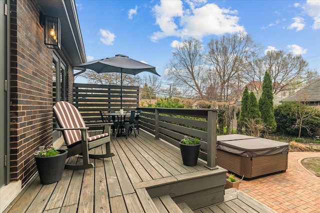 2087 W Greenleaf Ave, Chicago, IL 60645 - deck with a hot tub, outdoor dining area, and a patio area