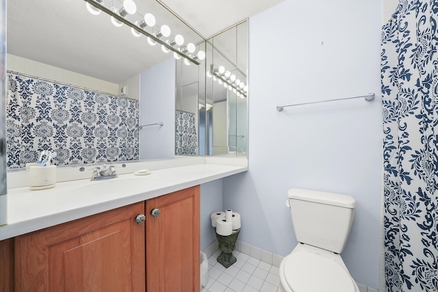 405 N Wabash Ave Unit 502, Chicago, IL 60611 - bathroom featuring tile patterned flooring, toilet, vanity, and baseboards