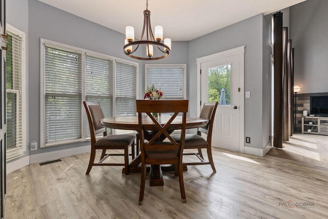 300 Knox Park Rd, Lake Zurich, IL 60047 - dining area featuring a chandelier and light wood-style flooring
