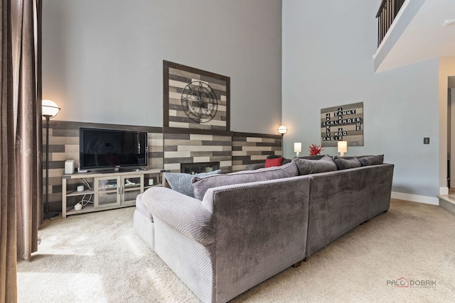 300 Knox Park Rd, Lake Zurich, IL 60047 - living room featuring a high ceiling, carpet flooring, and a fireplace