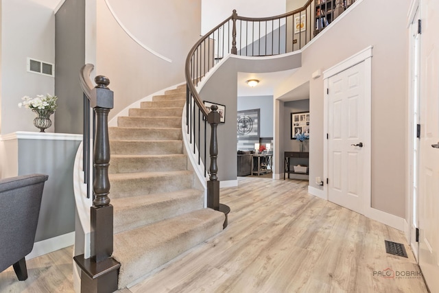 300 Knox Park Rd, Lake Zurich, IL 60047 - foyer featuring wood finished floors, a high ceiling, and stairway