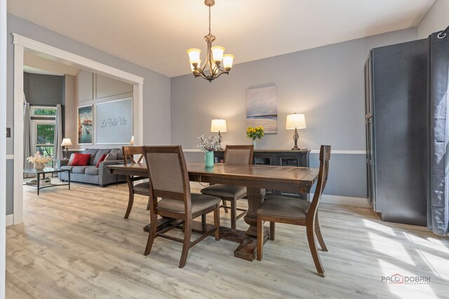 300 Knox Park Rd, Lake Zurich, IL 60047 - dining space featuring a chandelier and light wood-style floors