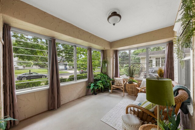 310 Forest Ave, Glen Ellyn, IL 60137 - sunroom featuring healthy amount of natural light, a textured wall, and carpet