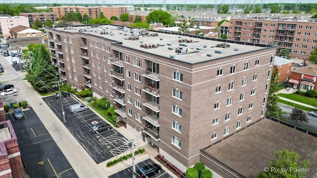 1327 Brown St Unit 206, Des Plaines, IL 60016 - view of apartment building / complex featuring uncovered parking