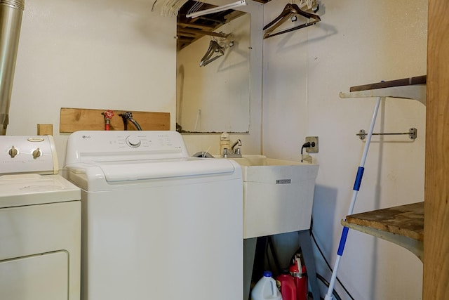 laundry area featuring washer and clothes dryer