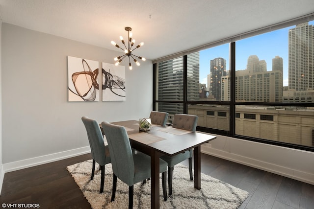 405 N Wabash Ave Unit 713, Chicago, IL 60611 - dining space featuring a chandelier, baseboards, dark wood-style flooring, and a view of skyline