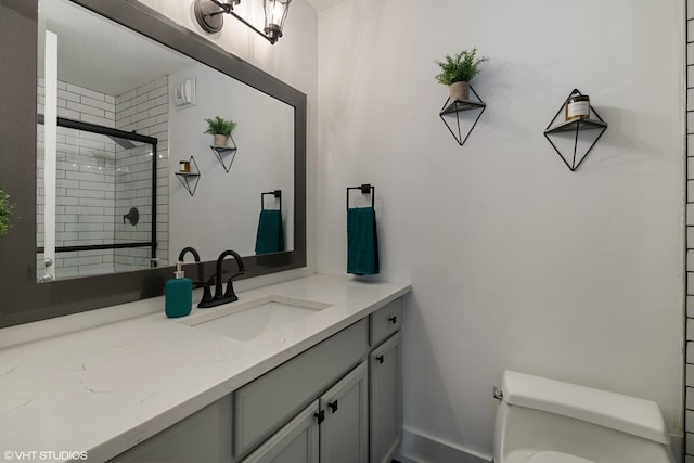 405 N Wabash Ave Unit 713, Chicago, IL 60611 - bathroom with toilet, vanity, and a tile shower