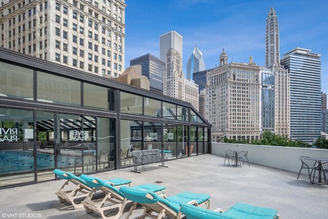 405 N Wabash Ave Unit 713, Chicago, IL 60611 - view of patio with a skyline view