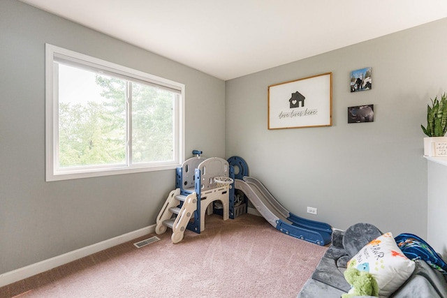 86 E Hummingbird Ave, Cortland, IL 60112 - playroom featuring carpet and baseboards