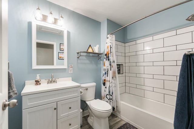 86 E Hummingbird Ave, Cortland, IL 60112 - bathroom featuring toilet, vanity, shower / bath combination with curtain, and wood finished floors