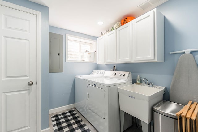 86 E Hummingbird Ave, Cortland, IL 60112 - washroom with electric panel, cabinet space, washer and clothes dryer, and baseboards