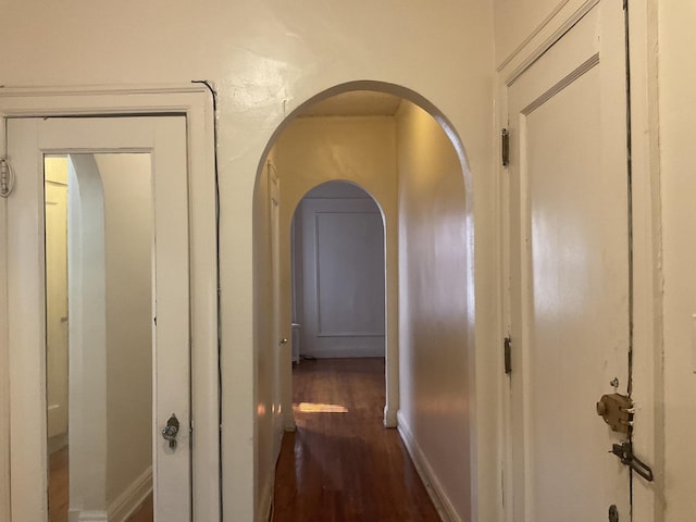 6832 S S Shore Dr Unit 1, Chicago, IL 60649 - hall with dark wood-style flooring and arched walkways