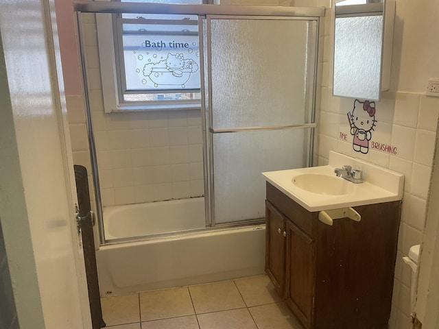 6832 S S Shore Dr Unit 1, Chicago, IL 60649 - bathroom featuring tile patterned flooring, vanity, and combined bath / shower with glass door